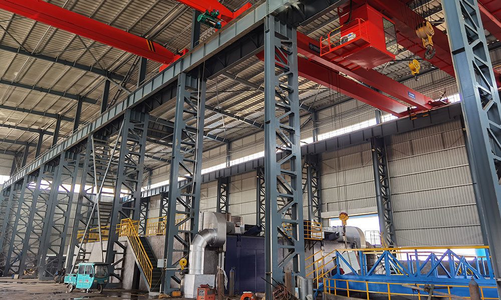 Overhead crane in metal abrasives factory